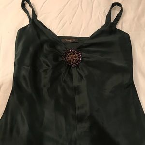 Silk dark green shirt with brooch